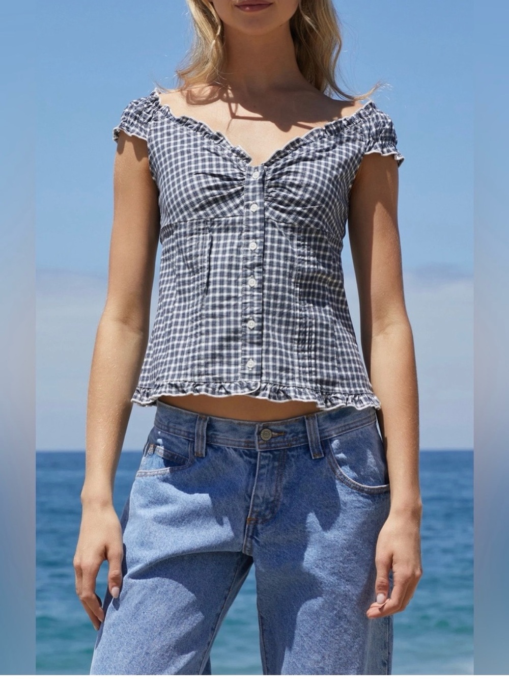 Brandy Melville navy blue and white plaid top.